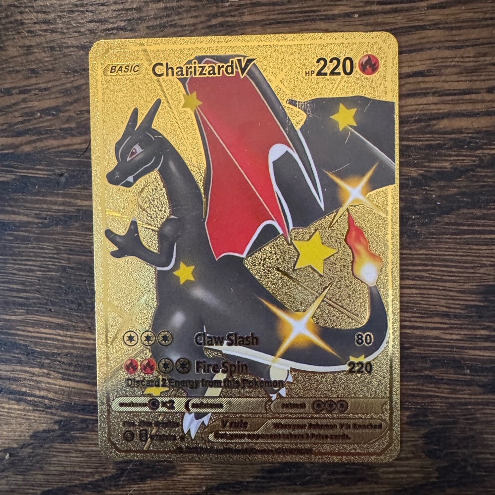 Pokemon Charizard V Gold Card with Red and Black